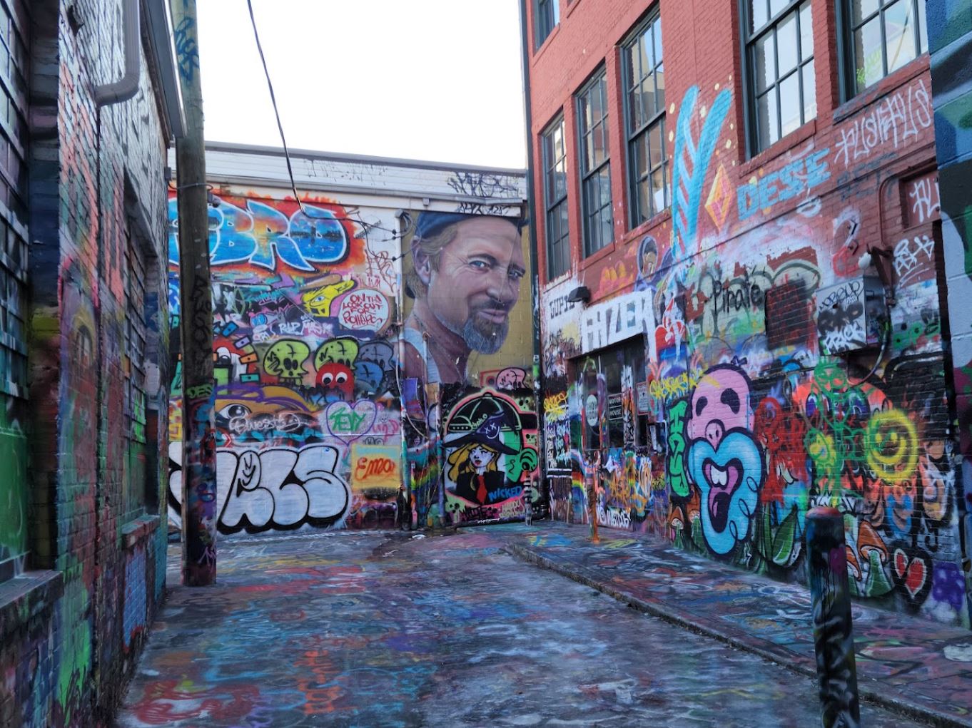 Graffiti Alley in Station North, Baltimore – the city’s only legal graffiti space filled with colorful street art.